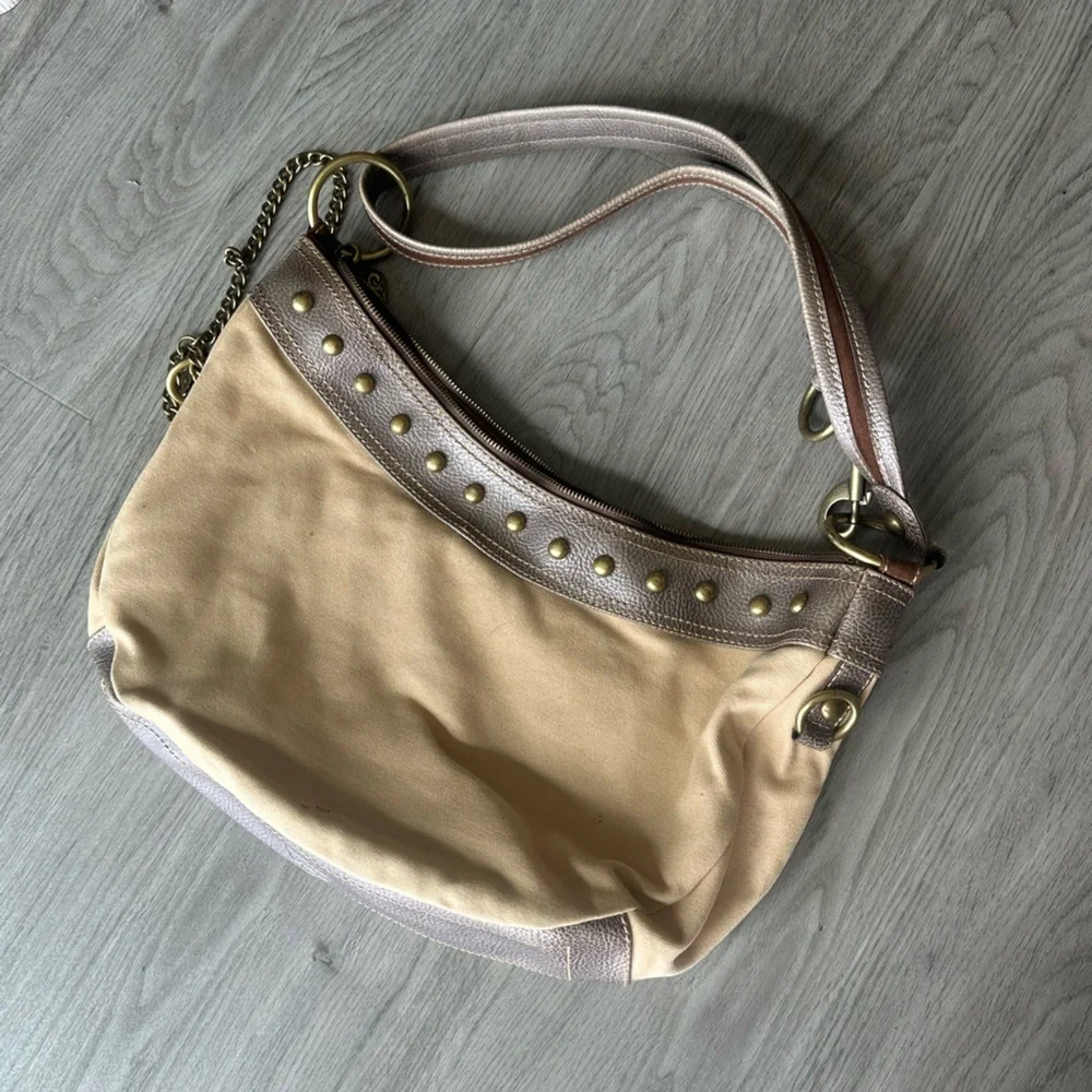 Kathy Van Zeeland brown and tan studded canvas + leather shoulder bag